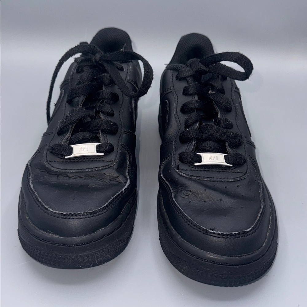 Nike Air Force 1 low top size 5 black Unisex